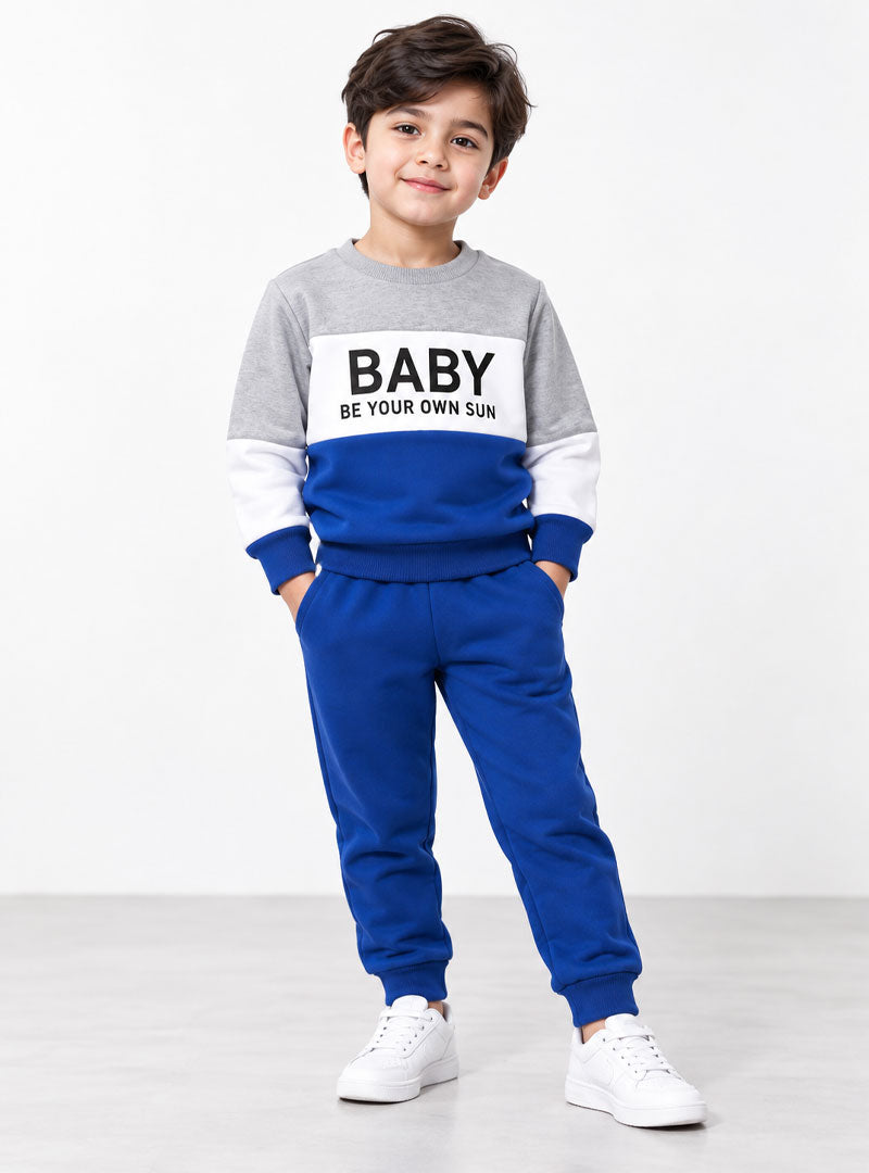 Boy modeling blue grey winter tracksuit