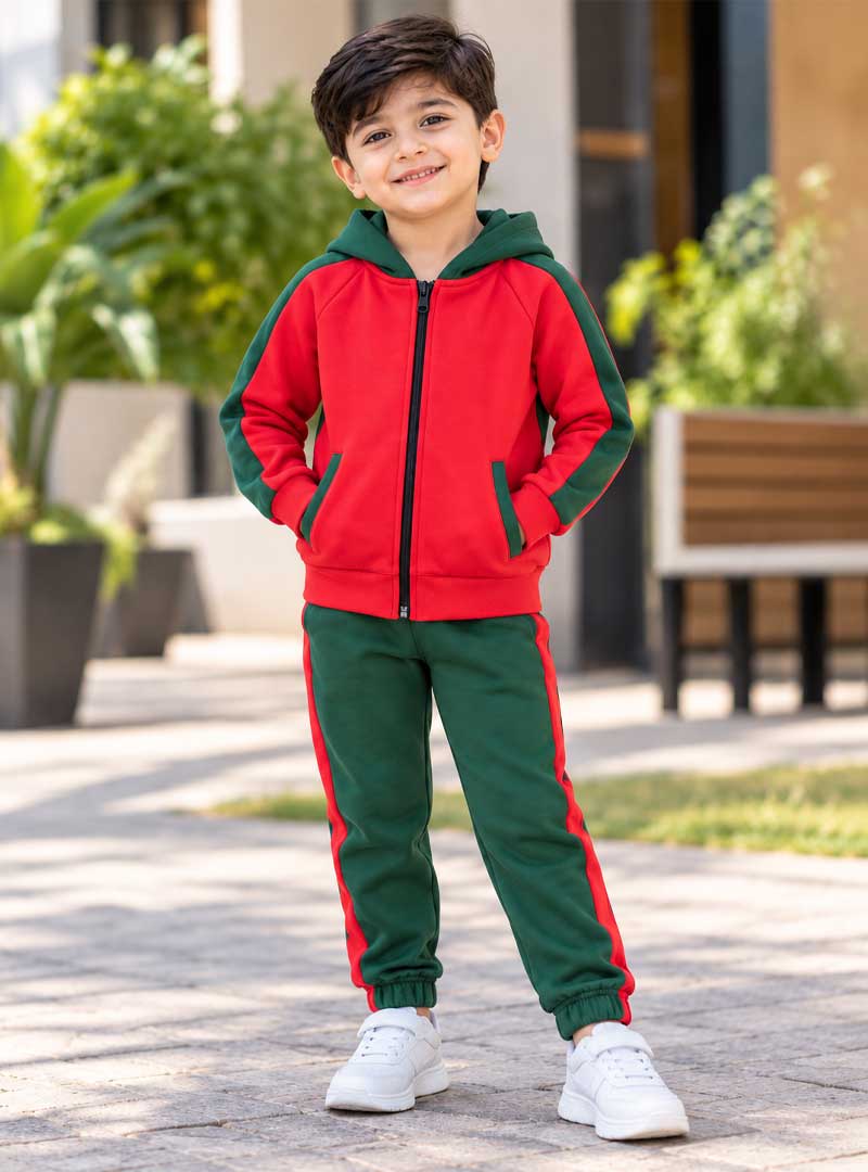 Boy wearing red and green hoodie and trouser winter tracksuit set